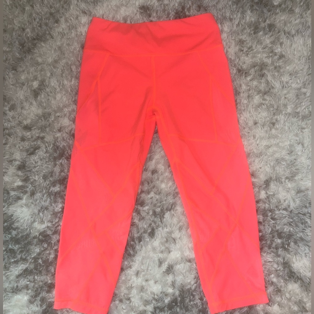 neon orange Sweaty Betty capri leggings, size S